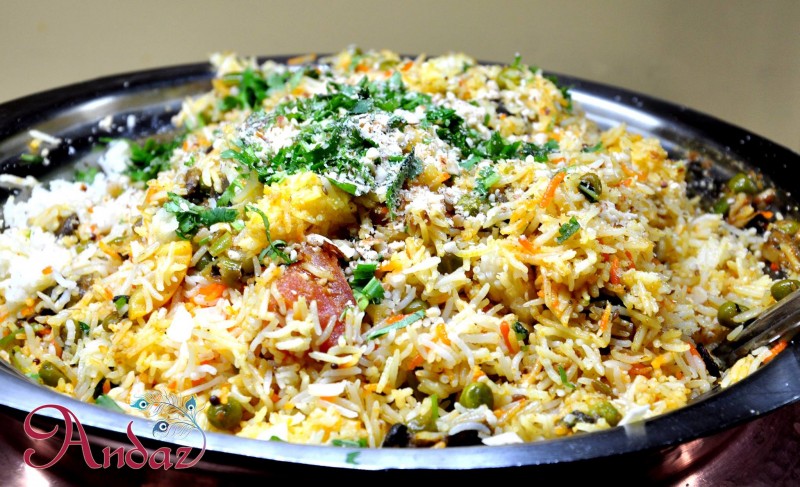 Vegetable Biryani is a featured dish at Andaz, which is regarded as one of the best Indian restaurants in Gainesville - 12 W University Ave, Gainesville, FL 32601. Photo courtesy of Andaz Indian Restaurant & Bar's official Facebook.